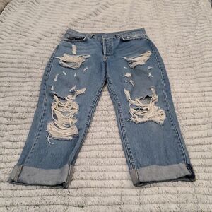 Medium wash button down hi-rise distressed Carmar jeans size 28